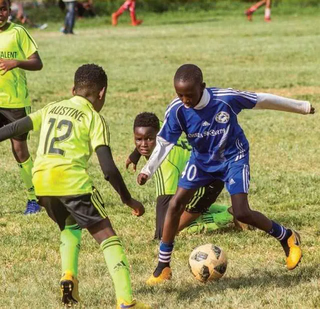 Jerome dribbling past soka talent players