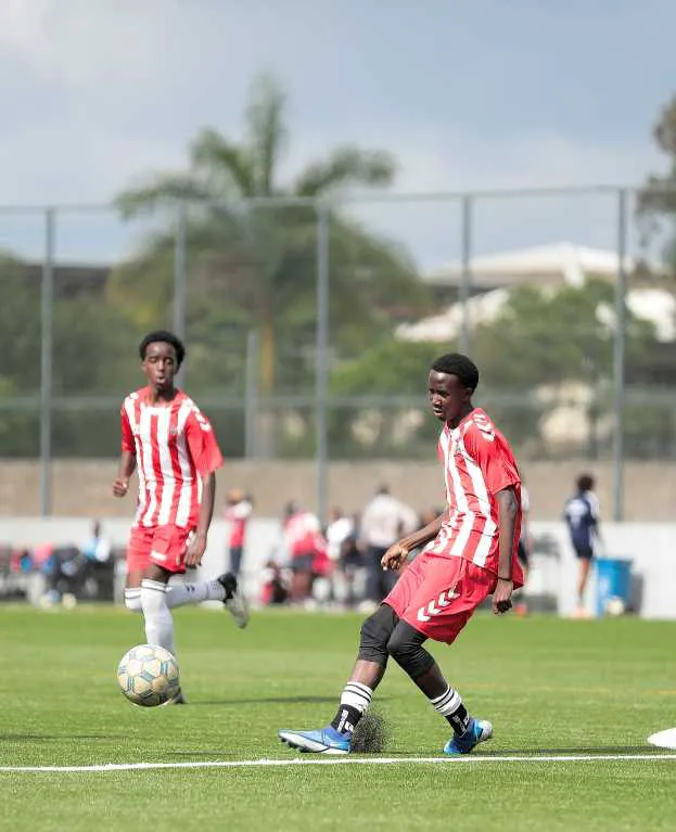 Jerome placing pass at MPESA Foundation grounds, Thika